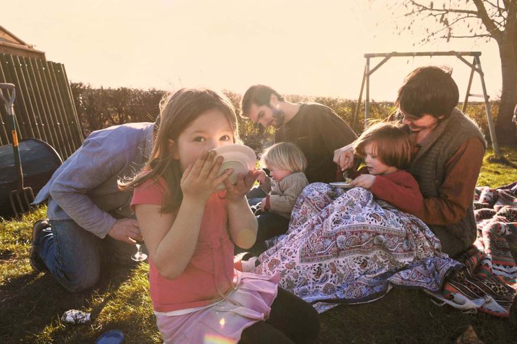 Family picnic in the garden. Somerset, UK
